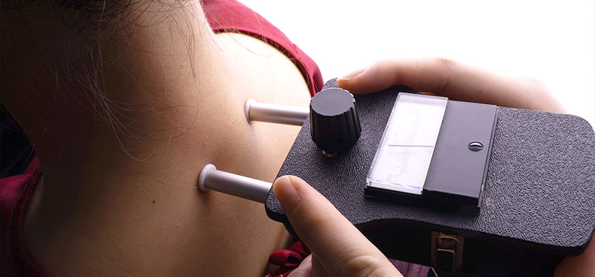 patient receiving gonstead technique in Novato